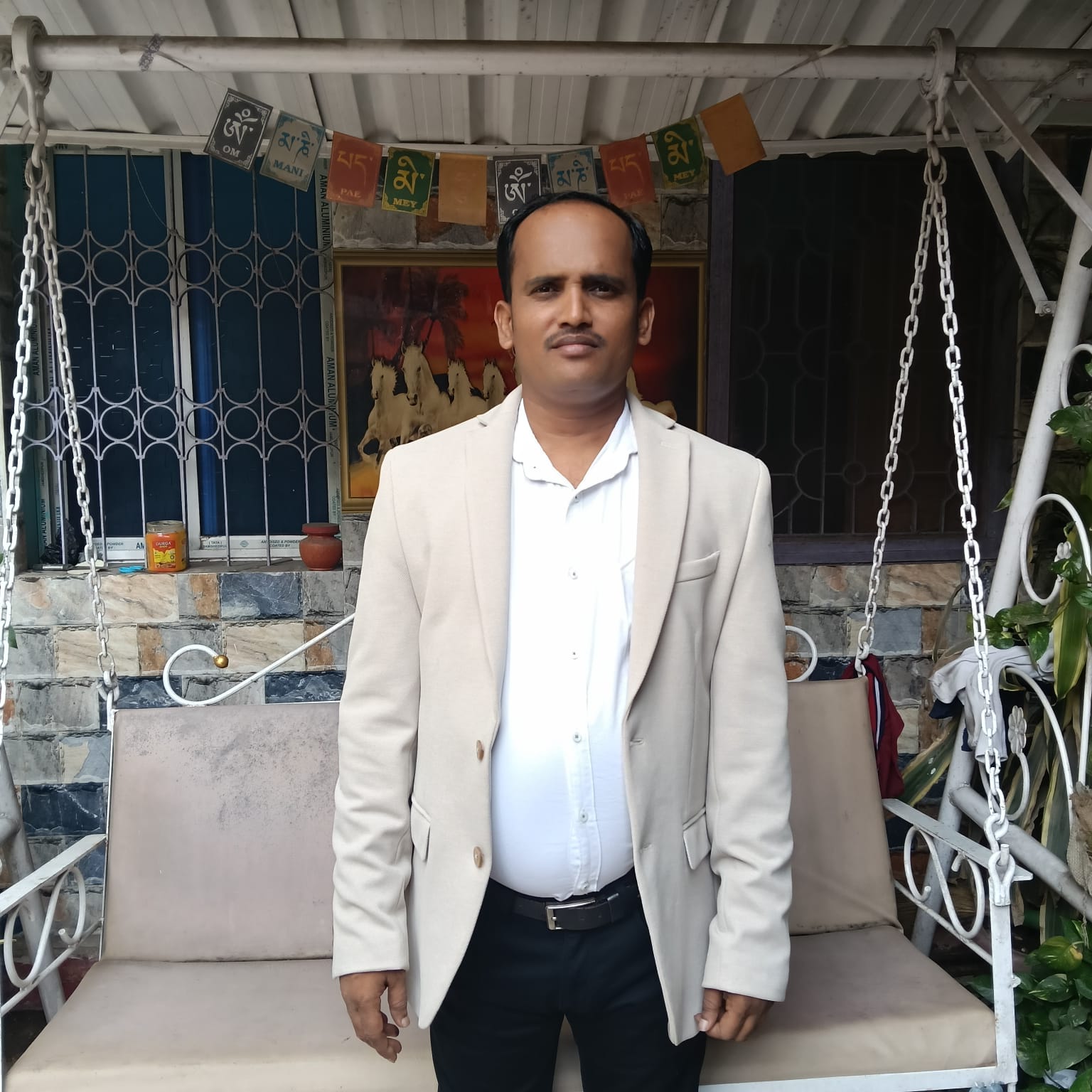 Indian female quality control manager in laboratory coat inspecting water quality with professional equipment 